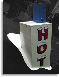 image of melting newspaper stand